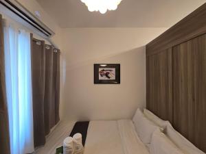 1BR Condotel with Balcony at FAME Residences #FM13-1