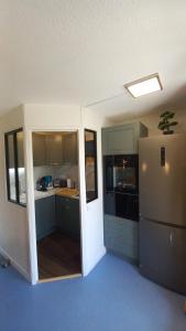 Appartements Les Epicuriens : photos des chambres