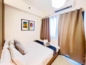 1BR Condotel with Balcony at FAME Residences #FM18-1