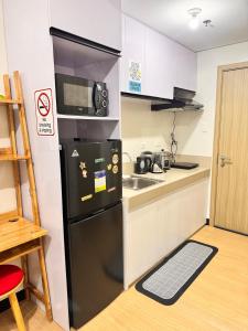 Condo in Greater Lagro Trees Residences 1