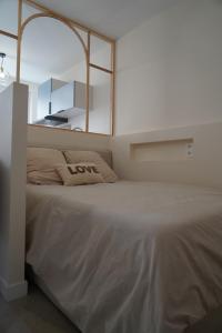 Appartements Les 20 bonheurs - Cosy pour 2 pers - Check-in 24-24 : photos des chambres