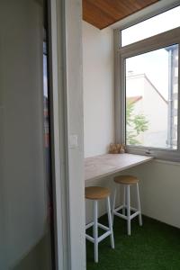 Appartements Les 20 bonheurs - Cosy pour 2 pers - Check-in 24-24 : photos des chambres
