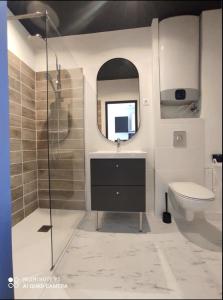 Appartements T2 proche centre-ville, stationnement facile : photos des chambres