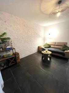 Appartements Grand jardin - Climatisation - parking privatif : photos des chambres