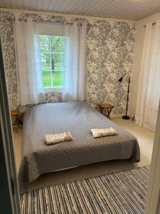 Wallinkoski accommodation - Rooms and Tentsile tent options next to River Vuoksi