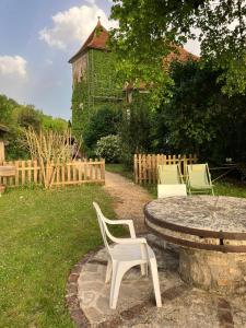Maisons de vacances A L Ombre du Tilleul : photos des chambres