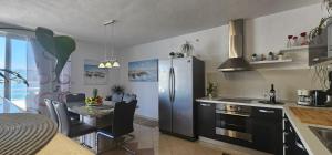 Luxury apartment MaLea with jacuzzi and sauna, by the sea