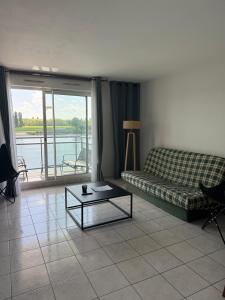 Appartements Appartement en bord de seine : photos des chambres