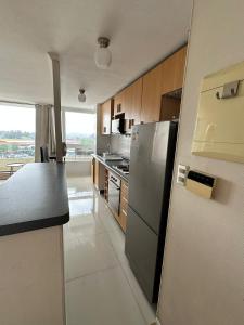 Cerca del aeropuerto, mall, Suractivo, casino, y todo !!