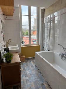 Maisons de vacances Maison familiale en centre-ville : photos des chambres
