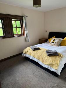 Oak Tree Cottage nestled in the hills of the Lake District and Yorkshire Dales