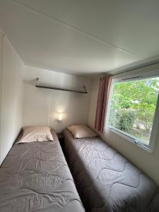 Campings mobil home AU SOLEIL : photos des chambres