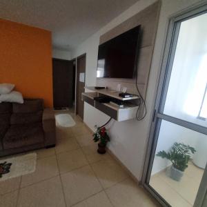 Apartamento completo com Wi-Fi, garagem em condomínio - Ideal para estadias tranquilas