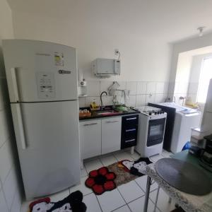 Apartamento completo com Wi-Fi, garagem em condomínio - Ideal para estadias tranquilas