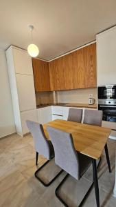 Gray Mirage Apartment near the beach