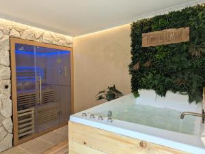 Maisons de vacances Cottage Lomy avec jacuzzi et sauna privatif : photos des chambres