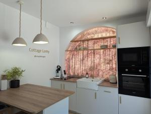 Maisons de vacances Cottage Lomy avec jacuzzi et sauna privatif : photos des chambres
