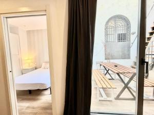 Piso con dos habitaciones con camas dobles y terrazas en el Poblenou