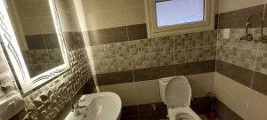 Fully finished 3-bedroom, 3-bathroom apartment with garden view in Jana Compound, Sheikh Zayed near Hyperone