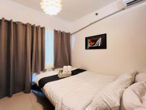 1BR Condotel with Balcony at FAME Residences #FM19-1