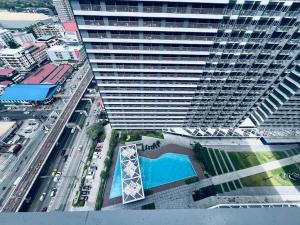 1BR Condotel with Balcony at FAME Residences #FM20-1