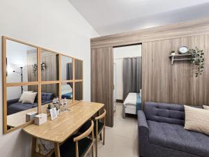 1BR Condotel with Balcony at FAME Residences #FM23-1