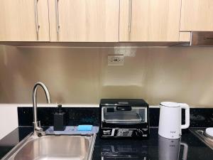 1BR Condotel with Balcony at FAME Residences #FM25-1