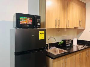 1BR Condotel with Balcony at FAME Residences #FM26-1