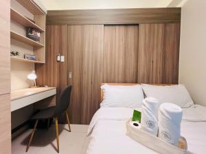 1BR Condotel with Balcony at FAME Residences #FM27-1