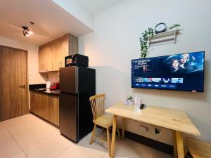 1BR Condotel with Balcony at FAME Residences #FM28-1