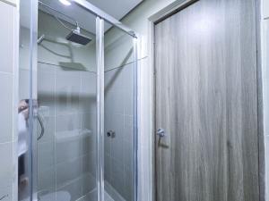 1BR Condotel with Balcony at FAME Residences #FM29-1