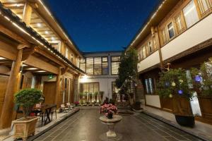 Crazy Stone Inn - 3hvězdičkové hotely ve městě Li-ťiang