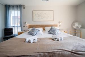 Appartements Le luminance - Appartement d'exception dans un quartier calme : photos des chambres