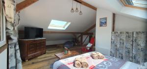 Maisons de vacances le home du Morel a Bellecombe : photos des chambres