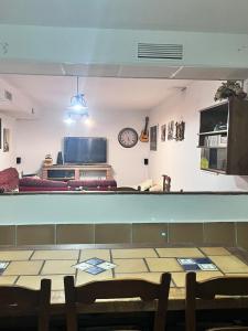 Basement with barbecue and patio