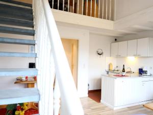 Einfach eingerichtete Masionettewohnung.