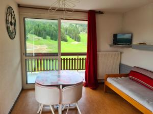 Appartements L- Eclat des Sommets en face et aux pieds des pistes : photos des chambres