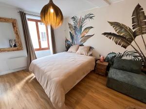 Appartements Cocon Jungle Hyper Centre : photos des chambres