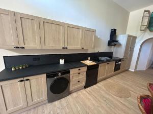 Appartements Gite dans un moulin avec terrasse : photos des chambres