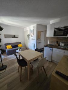 Appartements Appartement chaleureux : photos des chambres