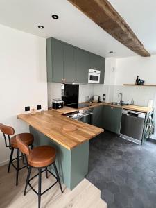 Appartements L-Atelier secret d-Elia : photos des chambres