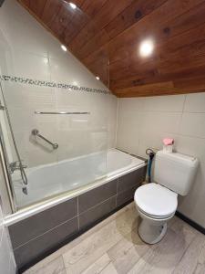 Appartements Au pied du chateau T3 : photos des chambres