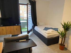 1 Zimmer Ferienapartment mit Parkmöglichkeit und Balkon - Διαμερίσματα, Neumünster