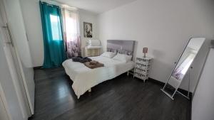 Maisons de vacances L-echappee medocaine, Bellevue ou Petite escapade : photos des chambres