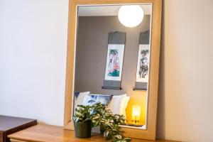 The Asian Zen Suite- Balcony - Netflix and City View