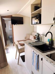 Appartements Petit cocon Douillet : photos des chambres