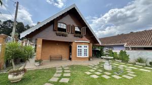 Casa estilo Chalé Suiço 37