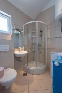 APARTMENTS BRUNO 3 - two-room penthouse apartment - wonderful view of the sea - the best location, first row to the beach - 10 minutes from Supetar ferry port - free secured parking - facilities nearby