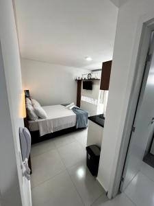 Aeroporto Loft Pé na Areia Floripa