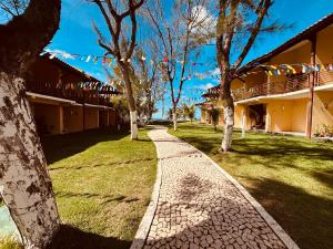 Village frente ao mar pé na areia